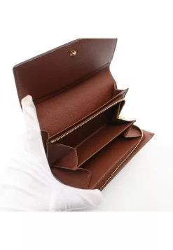 Pre-loved LOUIS VUITTON Porte-monnaie billet Terosr Classic Monogram Bi-fold Wallet PVC Genuine Leather Brown 12 Pre-loved LOUIS VUITTON Porte-monnaie billet Terosr Classic Monogram Bi-fold Wallet PVC Genuine Leather Brown -Louis Vuitton Shop louis vuitton 5237 1376936 3