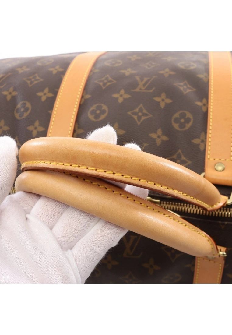 Pre-loved LOUIS VUITTON Keepall Bandouliere60 Classic Monogram Duffle Bag PVC Genuine Leather Brown 2 Way Style 10 Pre-loved LOUIS VUITTON Keepall Bandouliere60 Classic Monogram Duffle Bag PVC Genuine Leather Brown 2 Way Style - Image 8