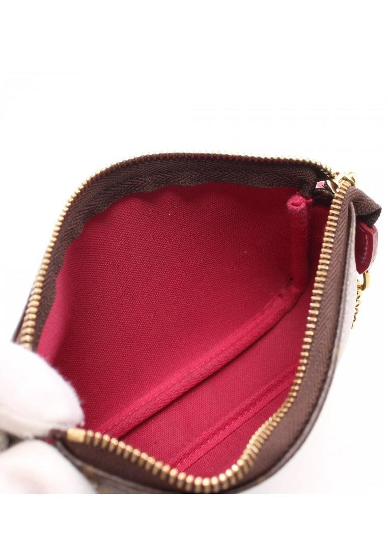 Pre-loved LOUIS VUITTON Mini Pochette Accessoires vivienne holiday Small Pocket PVC Genuine Leather Brown pink purple multi 5 Pre-loved LOUIS VUITTON Mini Pochette Accessoires vivienne holiday Small Pocket PVC Genuine Leather Brown pink purple multi - Image 3