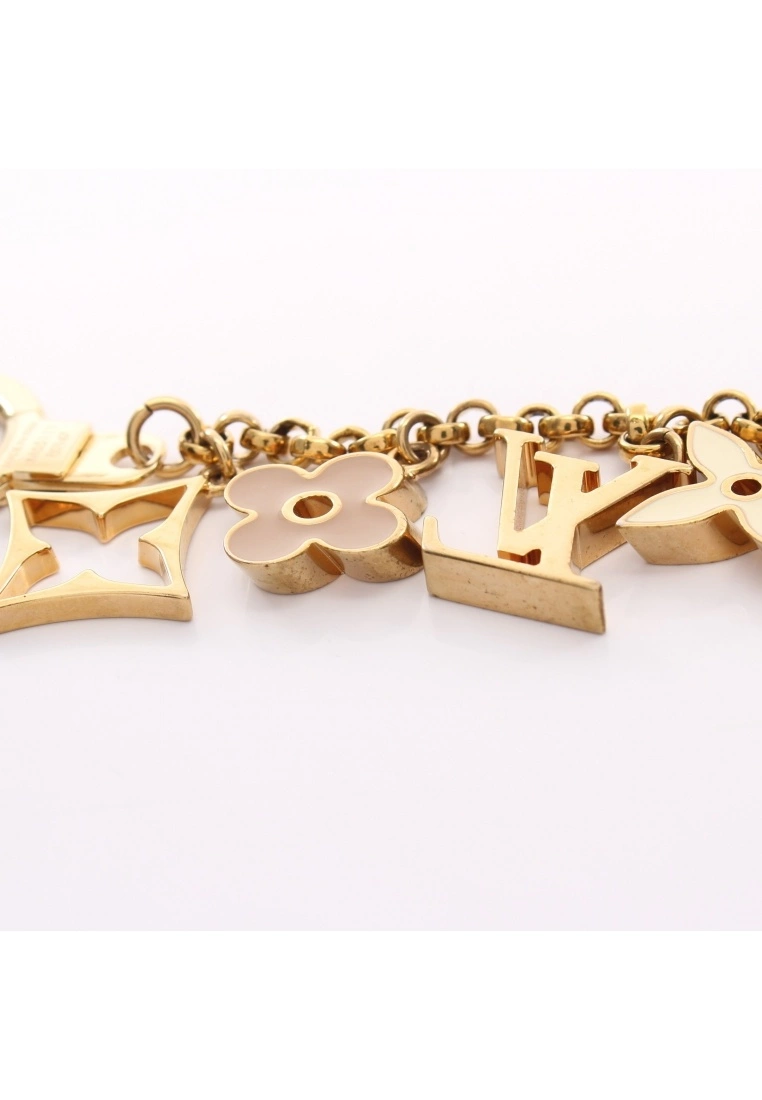 Pre-loved LOUIS VUITTON bag accessories Chain Fleur de Classic Monogram Key Ring bag accessories Gold Plated Gold Ivory pink 6 Pre-loved LOUIS VUITTON bag accessories Chain Fleur de Classic Monogram Key Ring bag accessories Gold Plated Gold Ivory pink - Image 4