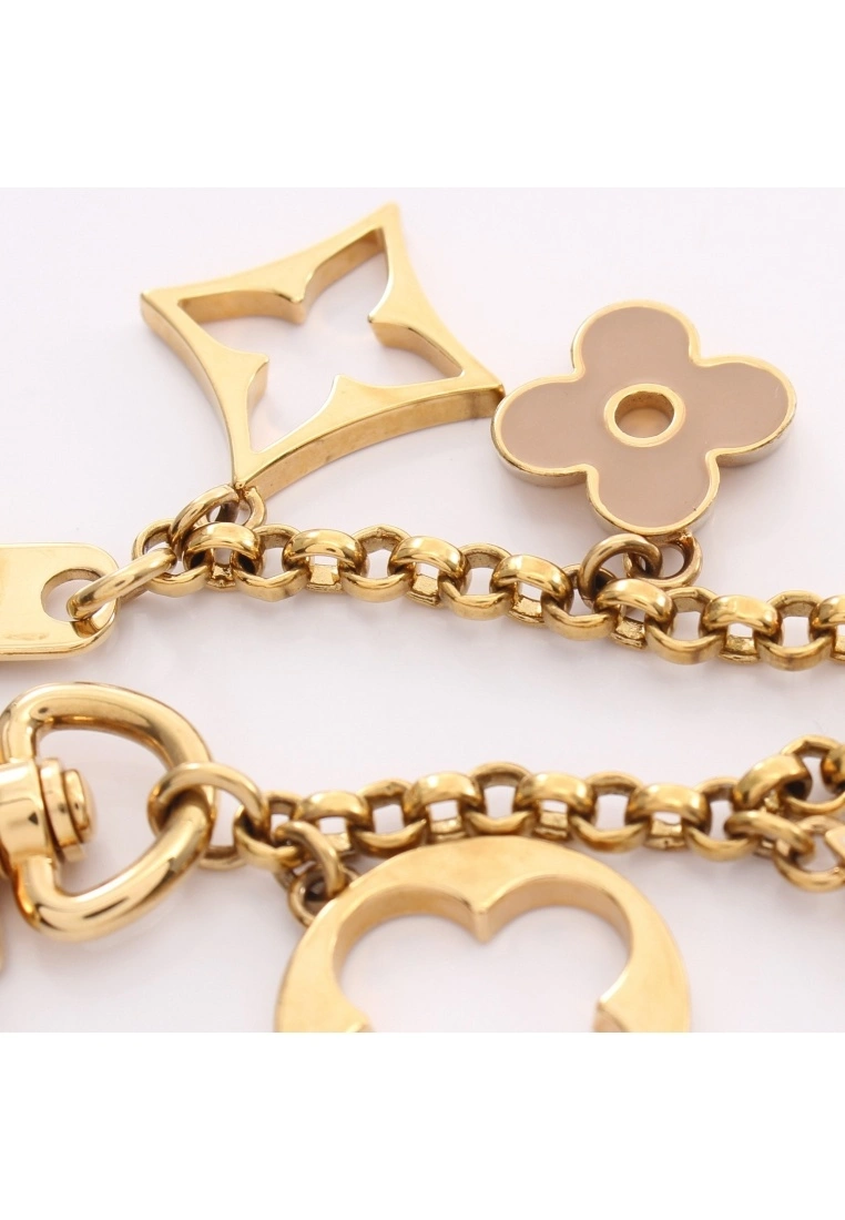 Pre-loved LOUIS VUITTON bag accessories Chain Fleur de Classic Monogram Key Ring bag accessories Gold Plated Gold Ivory pink 7 Pre-loved LOUIS VUITTON bag accessories Chain Fleur de Classic Monogram Key Ring bag accessories Gold Plated Gold Ivory pink - Image 5