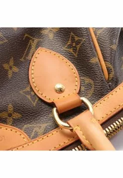 Pre-loved LOUIS VUITTON Tivoli PM Classic Monogram clutch PVC Leather Brown 17 Pre-loved LOUIS VUITTON Tivoli PM Classic Monogram clutch PVC Leather Brown -Louis Vuitton Shop louis vuitton 9322 6313836 8