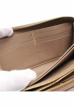Pre-loved LOUIS VUITTON Classic Monogram empreinte embossed Rounded corner zipper long Genuine Leather Wallet Beige 15 Pre-loved LOUIS VUITTON Classic Monogram empreinte embossed Rounded corner zipper long Genuine Leather Wallet Beige -Louis Vuitton Shop louis vuitton 9531 6208836 6