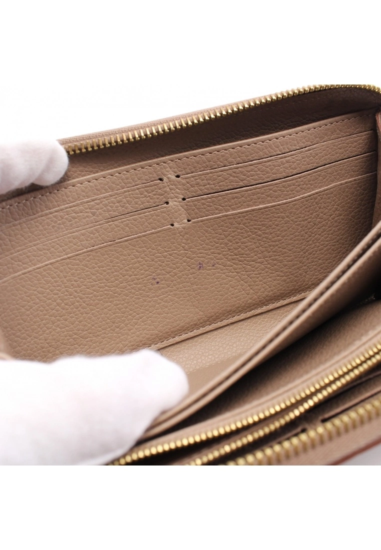 Pre-loved LOUIS VUITTON Classic Monogram empreinte embossed Rounded corner zipper long Genuine Leather Wallet Beige 8 Pre-loved LOUIS VUITTON Classic Monogram empreinte embossed Rounded corner zipper long Genuine Leather Wallet Beige - Image 6
