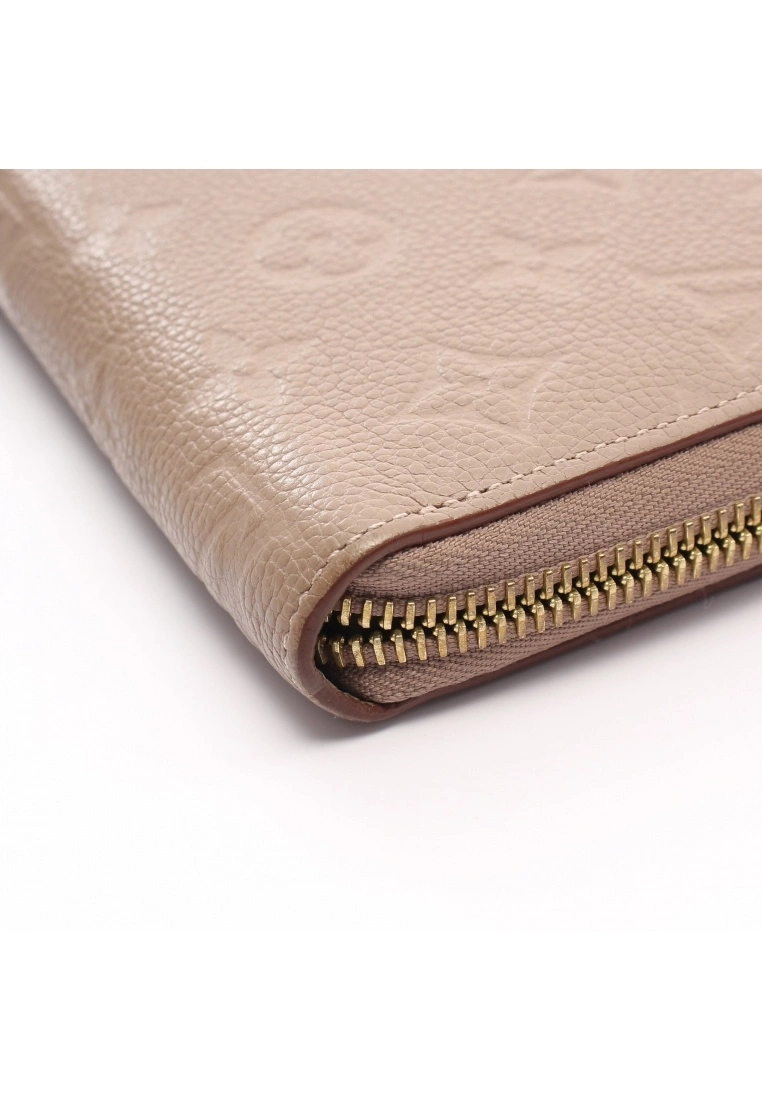 Pre-loved LOUIS VUITTON Classic Monogram empreinte embossed Rounded corner zipper long Genuine Leather Wallet Beige 10 Pre-loved LOUIS VUITTON Classic Monogram empreinte embossed Rounded corner zipper long Genuine Leather Wallet Beige - Image 8
