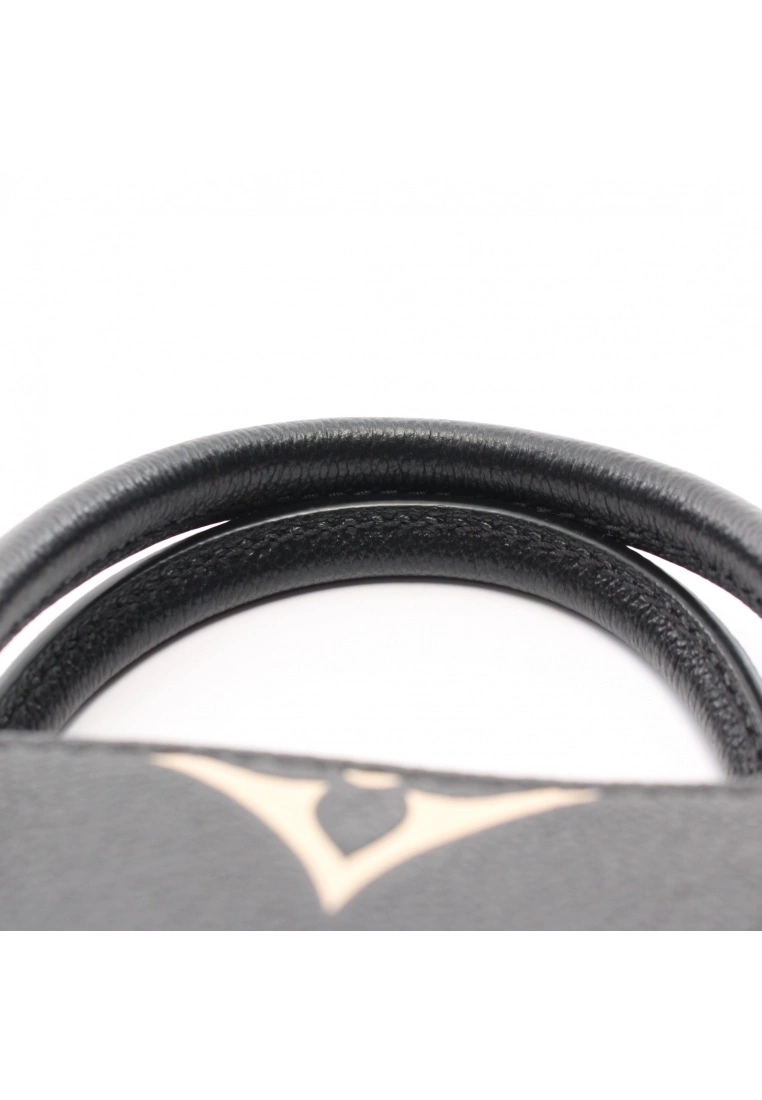 Pre-loved LOUIS VUITTON OnTheGo PM 2 Colored Classic Monogram empreinte embossed Genuine Leather Handbag Black Beige 2 Way Style 8 Pre-loved LOUIS VUITTON OnTheGo PM 2 Colored Classic Monogram empreinte embossed Genuine Leather Handbag Black Beige 2 Way Style - Image 6